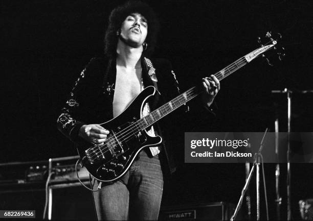 Phil Lynott of Thin Lizzy performing on stage at Rainbow Theatre, London, 11 November 1974. He is playing a Rickenbacker 4001 bass guitar.
