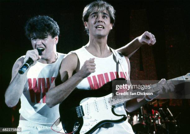 George Michael and Andrew Ridgley of Wham! performing on stage at Hammersmith Odeon, London, 28 October 1983.