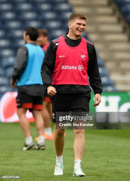 Saracens player Owen Farrell shares a joke during the captains run before the 2017 European Rugby Champions Cup Final at Murrayfield Stadium on May...