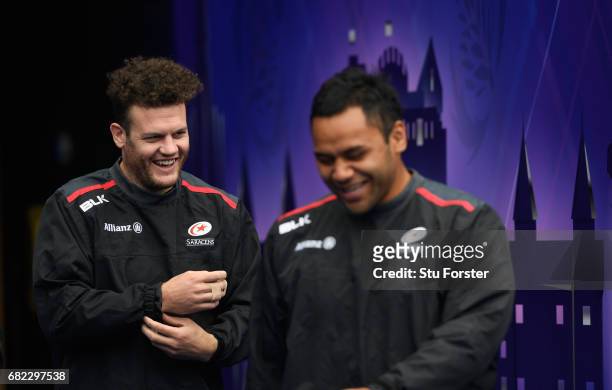 Saracens players Duncan Taylor and Billy Vunipola share a joke as they make their way onto the field for the captains run before the 2017 European...