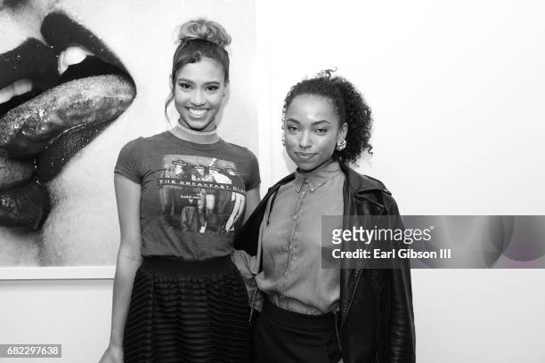 Actress Kara Royster and actress Logan Browning attend Tyler Shields "Provocateur" Opening at Leica Store and Gallery Los Angeles on May 11, 2017 in...