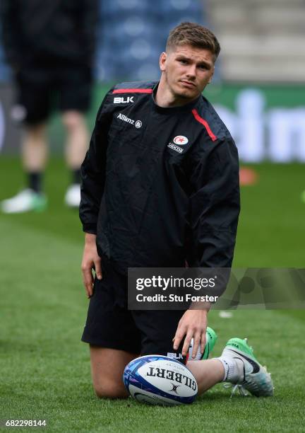 Saracens player Owen Farrell warms up during the captains run before the 2017 European Rugby Champions Cup Final at Murrayfield Stadium on May 12,...