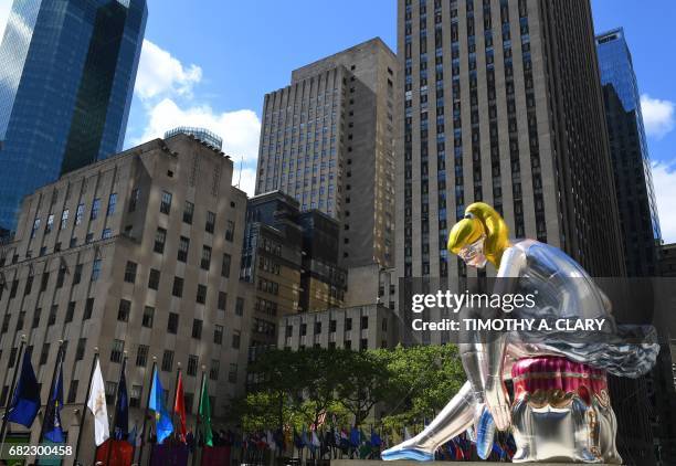 The public art exhibition of a 45-foot tall inflatable nylon sculpture depicting a seated ballerina from artist Jeff Koons' Antiquity series titled...