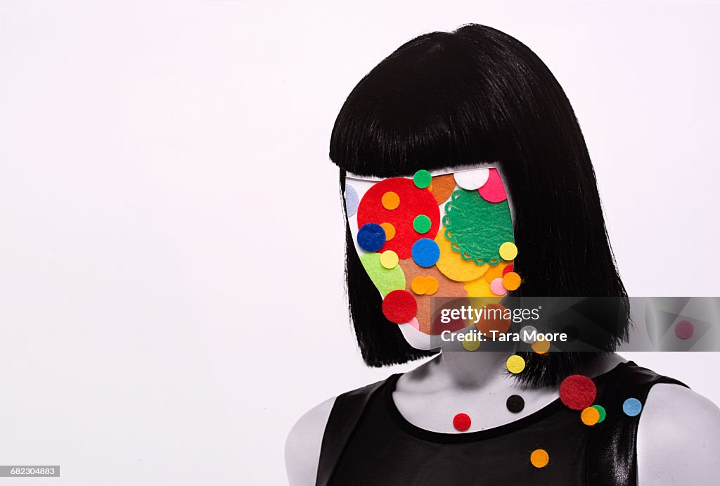 Collage of woman with felt circles on head