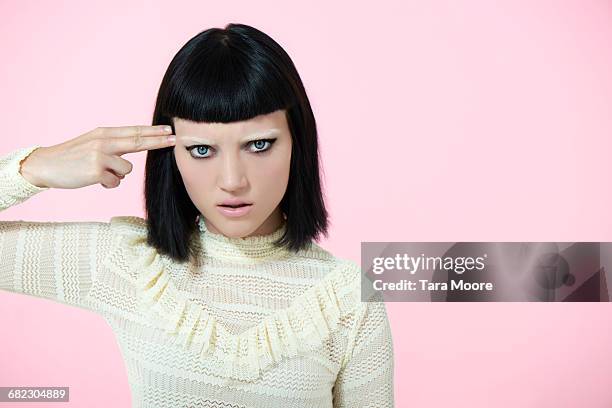 woman shooting herself in the head - frustration photos stock pictures, royalty-free photos & images