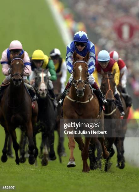 June 08: Eddie Ahern and Nayyir land The Vodafone Diomed Stakes run at Epsom Racecourse in Epsom on June 08, 2002.