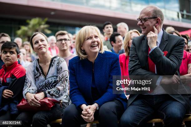 German Social Democrats lead candidate Hannelore Kraft sits next to supporters at the final SPD campaign rally in state elections in North...