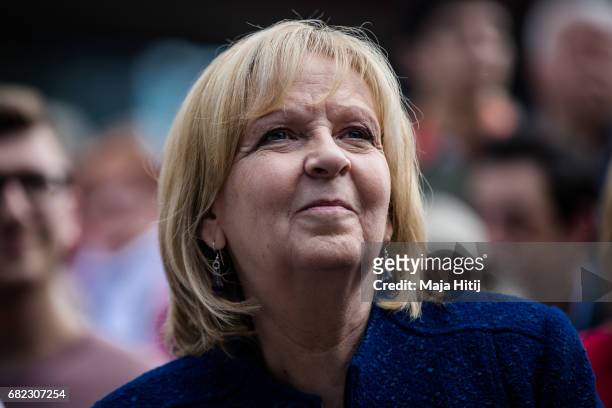 German Social Democrats lead candidate Hannelore Kraft sits next to supporters at the final SPD campaign rally in state elections in North...