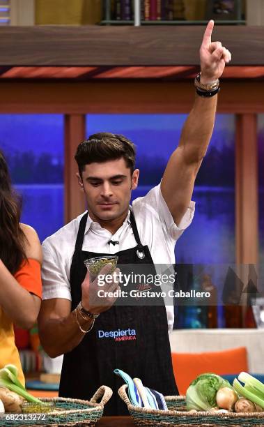 Zac Efron is on the set of 'Despierta America' to promote the film 'Baywatch' at Univision Studios on May 12, 2017 in Miami, Florida.