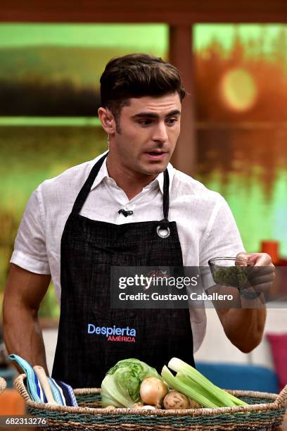 Zac Efron is on the set of 'Despierta America' to promote the film 'Baywatch' at Univision Studios on May 12, 2017 in Miami, Florida.