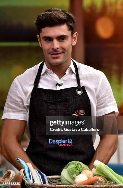 Zac Efron is on the set of 'Despierta America' to promote the film 'Baywatch' at Univision Studios on May 12, 2017 in Miami, Florida.