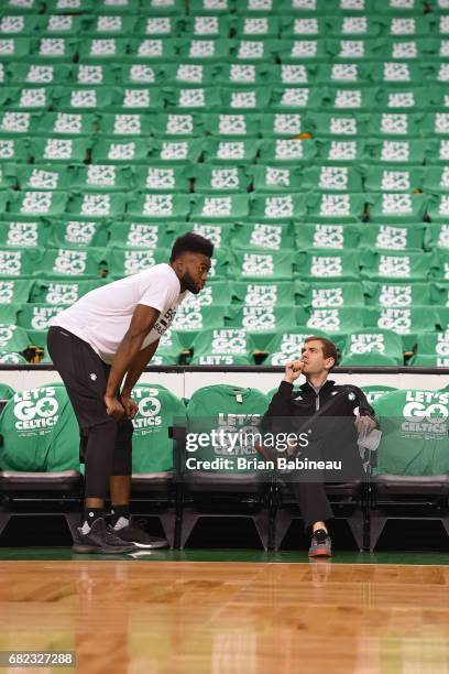 Jaylen Brown and Brad Stevens of the Boston Celtics talk before Game Five of the Eastern Conference Semifinals against the Washington Wizards during...