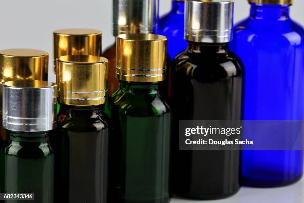 full frame of colorful minature bottles - mist diffuser stock pictures, royalty-free photos & images