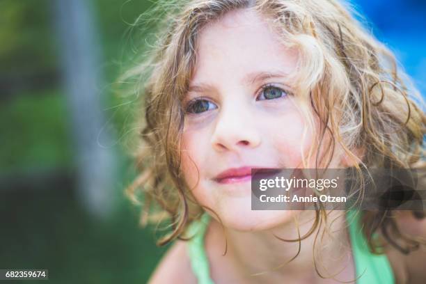 portrait of a girl with curly hair - annie otzen stock pictures, royalty-free photos & images