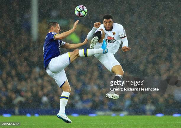 Phil Jagielka of Everton and Troy Deeney of Watford compete for the ball during the Premier League match between Everton and Watford at Goodison Park...