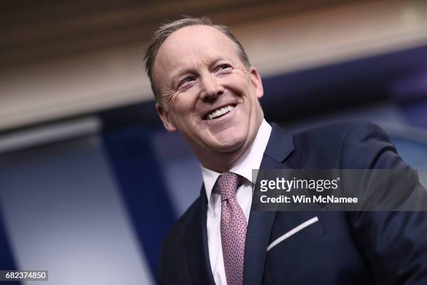 White House Press Secretary Sean Spicer listens to National Security Advisor H.R. McMaster during the daily news conference in the Brady Press...