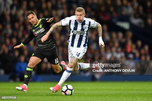 Chelsea's Belgian midfielder Eden Hazard and West Bromwich Albion's Irish midfielder James McClean vie during the English Premier League match...