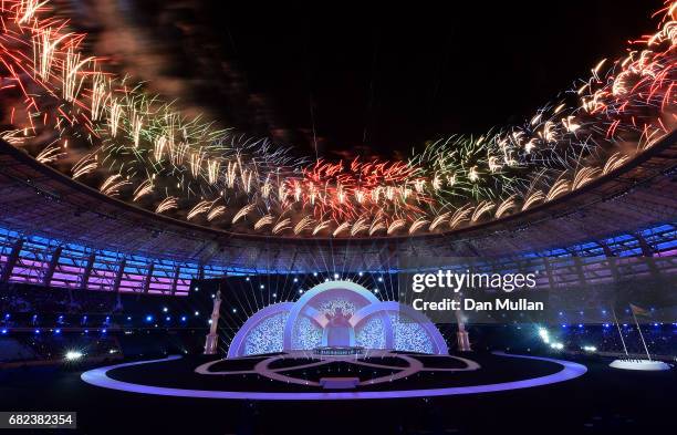 Fireworks are set off as the Azerabaijan flag is raised during the Opening Ceremony of Baku 2017 - 4th Islamic Solidarity Games at the Olympic...