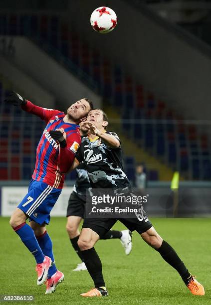 Zoran Tosic PFC CSKA Moscow challenged by Alexandru Bourceanu of FC Arsenal Tula during the Russian Premier League match between PFC CSKA Moscow and...