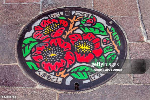 artistic manhole cover - マンホール ストックフォトと画像