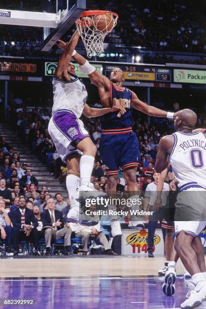 Corliss Williamson of the Sacramento Kings dunks circa 1996 at Arco Arena in Sacramento, California. NOTE TO USER: User expressly acknowledges and...