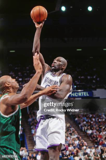 Olden Polynice of the Sacramento Kings shoots circa 1996 at Arco Arena in Sacramento, California. NOTE TO USER: User expressly acknowledges and...