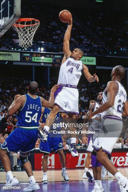 Corlis Williamson of the Sacramento Kings dunks circa 1996 at Arco Arena in Sacramento, California. NOTE TO USER: User expressly acknowledges and...
