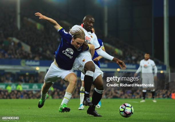 Tom Davies of Everton and Stefano Okaka of Watford battle for possession during the Premier League match between Everton and Watford at Goodison Park...