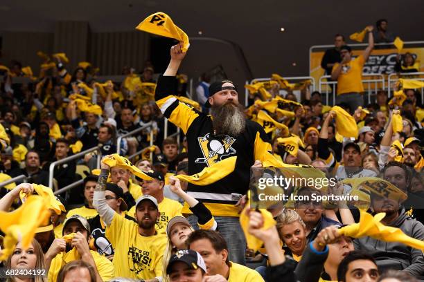 Pittsburgh Penguins fans cheer and wave towels during the first period in Game Six of the Eastern Conference Second Round in the 2017 NHL Stanley Cup...