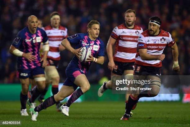 Jules Plisson of Stade Francais makes a break during the European Rugby Challenge Cup Final between Gloucester and Stade Francais at Murrayfield...