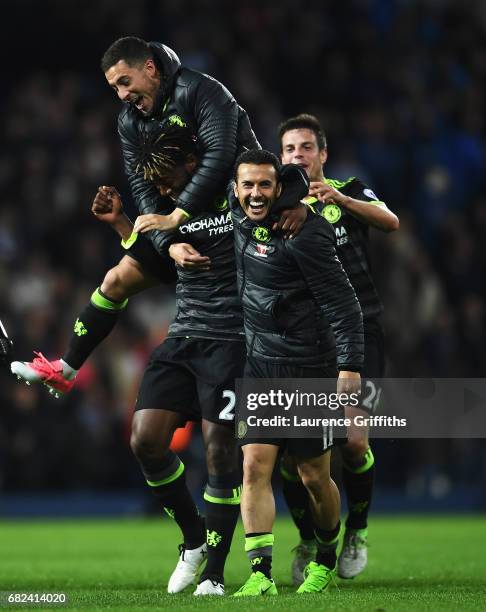Michy Batshuayi of Chelsea, Eden Hazard of Chelsea and Pedro of Chelsea celebrate winning the league after the Premier League match between West...