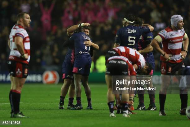 Rabah Slimani and Djibril Camara of Stade Francais celebrate their team's 25-17 victory during the European Rugby Challenge Cup Final between...