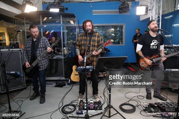 Dale Stewart, John Humphrey, Shaun Morgan and Clint Lowery of Seether perform on SiriusXM's Octane at SiriusXM Studios on May 12, 2017 in New York...