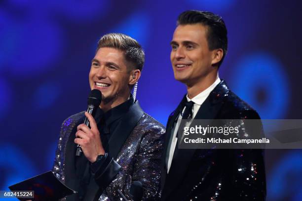 Presenters Volodymyr Ostapchuk and Oleksandr Skichko speak on stage during the rehearsal for ''The final of this year's Eurovision Song Contest'' at...