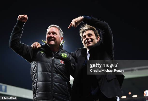Antonio Conte, Manager of Chelsea and Steve Holland, Chelsea first team coach celebrate winning the league after the Premier League match between...