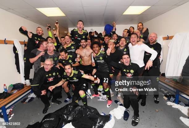 The Chelsea team celebrate winning the leauge in the changing room after the Premier League match between West Bromwich Albion and Chelsea at The...