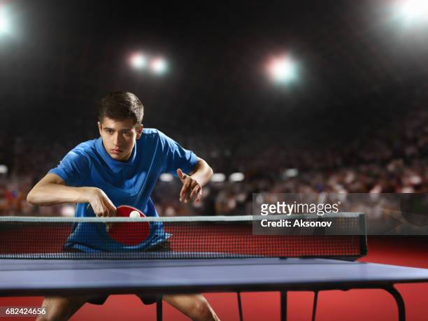 young ping pong player playing table tennis game - table tennis world championships stock pictures, royalty-free photos & images