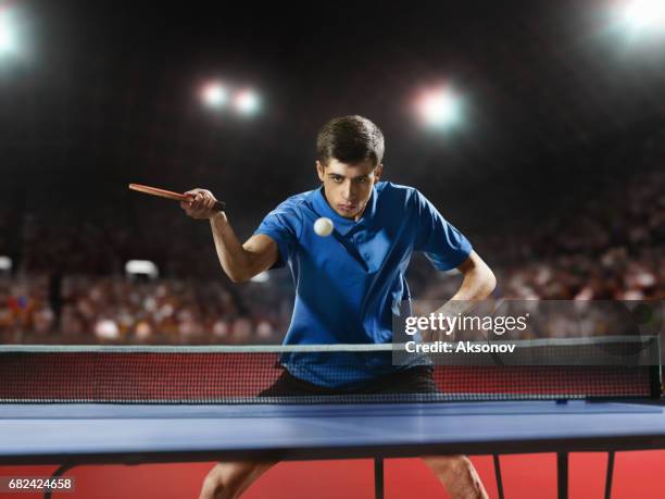 young ping pong player playing table tennis game - table tennis world championships stock pictures, royalty-free photos & images