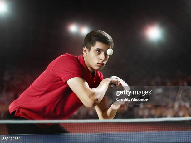 young ping pong player playing table tennis game - table tennis world championships stock pictures, royalty-free photos & images