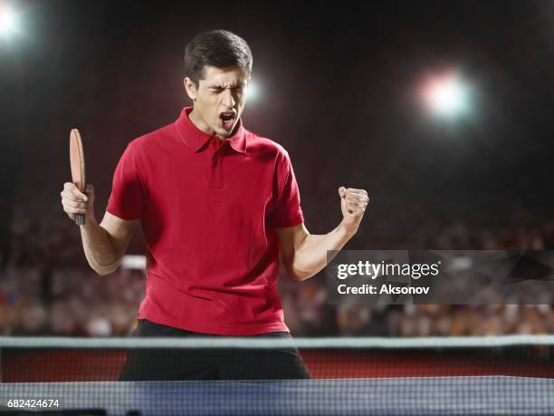 young ping pong player rejoices in his victory - table tennis world championships stock pictures, royalty-free photos & images