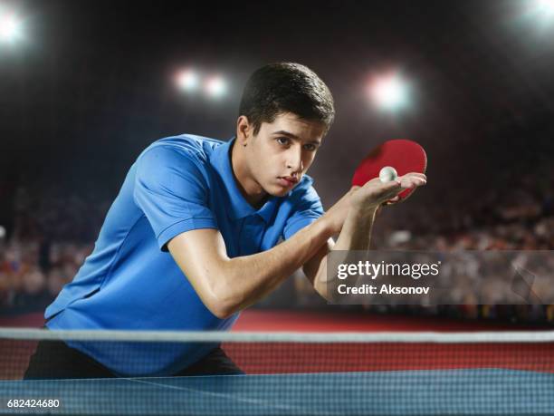 young ping pong player playing table tennis game - table tennis world championships stock pictures, royalty-free photos & images