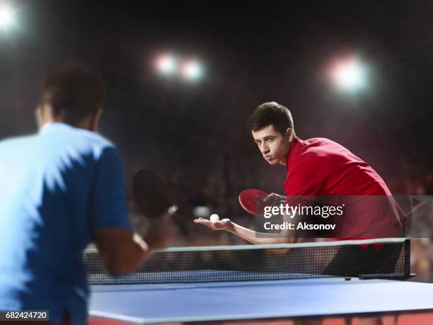 two ping pong players play table tennis - table tennis world championships stock pictures, royalty-free photos & images