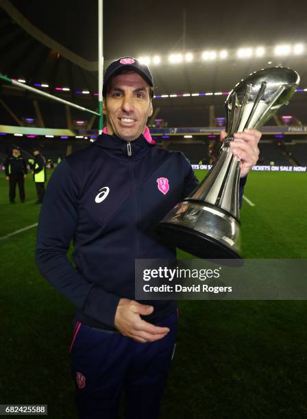 Gonzalo Quesada the Head Coach of Stade Francais celebrates with the trophy following his team's 25-17 victory during the European Rugby Challenge...