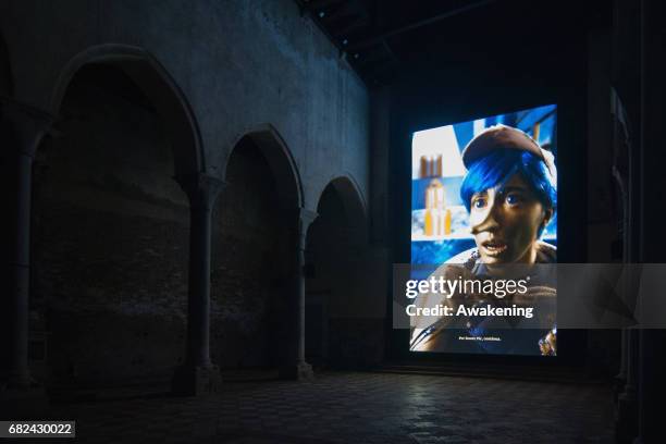 Visitors attend the collaterals exhibition 'Scotland + Venice presents Rachel Macleans Spite Your Face' of Scotland + Venice during the 57th Biennale...