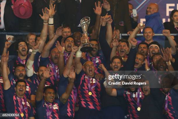 Sergio Parisse of Stade Francais lifts the trophy following his team's 25-17 victory during the European Rugby Challenge Cup Final between Gloucester...