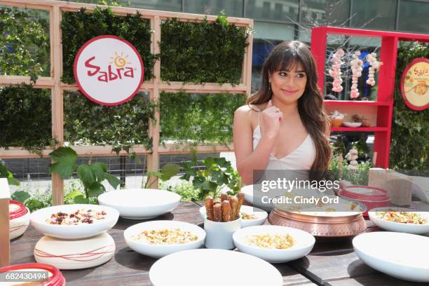 Lea Michele attends an Unofficial Meal event in NYC celebrating #NationalHummusDay hosted by Lea Michele & Sabra Dipping Company at Astor Place on...