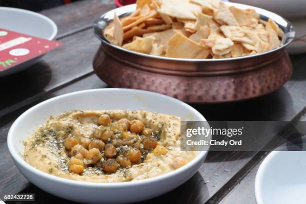 View of an Unofficial Meal event in NYC celebrating #NationalHummusDay hosted by Lea Michele & Sabra Dipping Company at Astor Place on May 12, 2017...