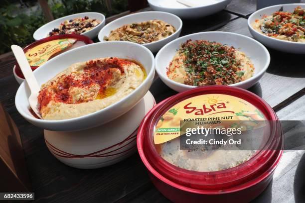 View of an Unofficial Meal event in NYC celebrating #NationalHummusDay hosted by Lea Michele & Sabra Dipping Company at Astor Place on May 12, 2017...