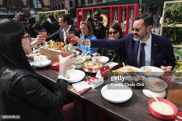 Eugenio Perrier attends an Unofficial Meal event in NYC celebrating #NationalHummusDay hosted by Lea Michele & Sabra Dipping Company at Astor Place...