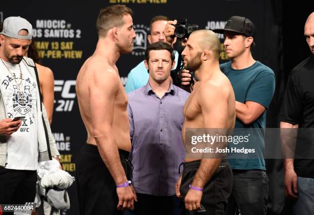 Joachim Christensen of Denmark and Gadzhimurad Antigulov of Russia face off during the UFC 211 weigh-in at the American Airlines Center on May 12,...